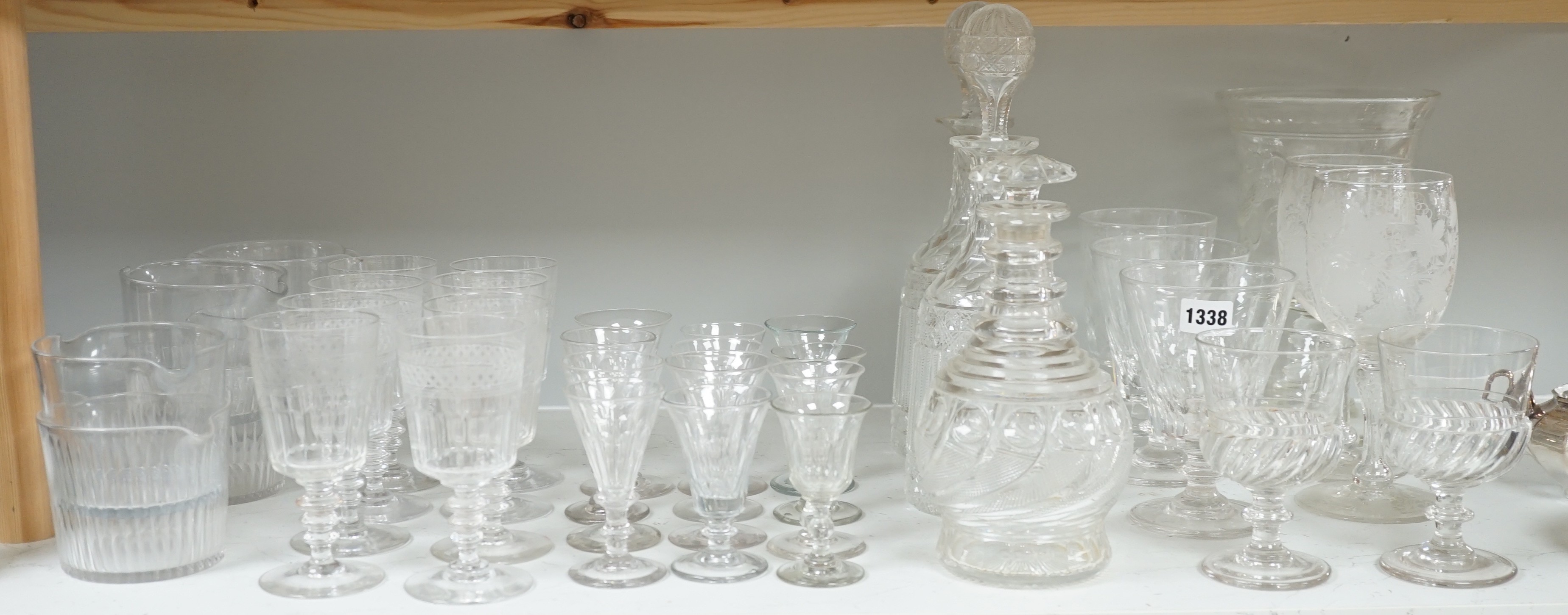 Assorted 19th and 20th century drinking glasses, rinsers, an etched vase, a pair of cut glass decanters and a late Georgian Anglo-Irish decanter and stopper